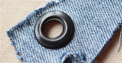 how to put metal holes in fabric|installing eyelets in fabric.